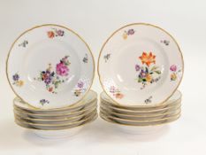 Royal Copenhagen Bing and Grondahl porcelain set of plates, hand painted in the Dresden floral style