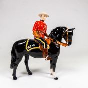 Beswick model of a Canadian Mountie on black horse, model 1375, h.21cm.
