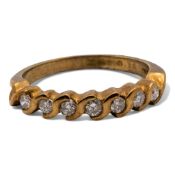 9ct Gold diamond set 7 stone ring, size O, 2.42g.