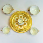 De Lamerie Fine Bone China tea ware, with heavy gilt decoration on pink/cream ground. Made in