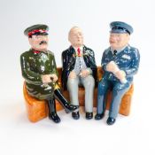 The Big Three seated on a bench at the Yalta Conference February 1945. Churchill in RAF uniform,