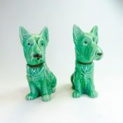 A Sylvac pair of seated Terriers, green glazed with brown collars, model no1208 (778504). Height