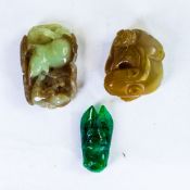 A collection of Chinese carved Jade items in different colours, largest 5cm x 3cm. (3)