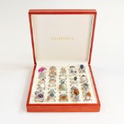 A good job lot collection of Silver ladies rings, each set with semi-precious stones in leather
