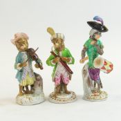 Three Meissen figurines from the Monkey Band - Drummer, Bassoon player & Violinist. (3)