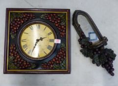 20th-century quartz wall clock with grape and vine three-dimensional decoration, together with a