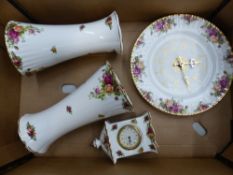 Royal Albert Old Country Roses pattern items to include a pair of large flared vases, a wall clock