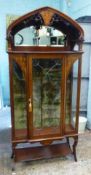 Art nouveau inlaid mahogany stained glass display cabinet. Domed top with mirror back upper