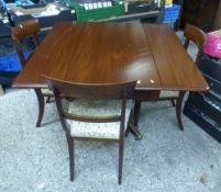 Mahogany drop leaf dining table with 3 curved back mahogany dining chairs, upholstered with a floral