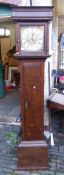 An Oak cased longcase 8 day movement clock made by John Ewer, London with brass face and silver chap