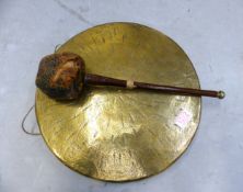 Vintage brass hanging gong and leather striker (striker head in a very distressed condition),