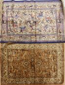 Two tassel edged rugs, one bright cream/brown floral, deer design together with cream/blue