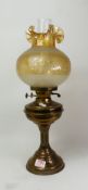 Brass oil lamp with glass chimney and shade, overall height 55cm.