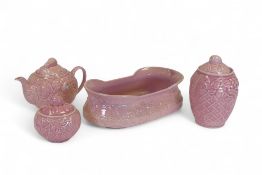 Wade pink with basketweave pattern to include teapot, lidded jar and lidded sugar bowl, together