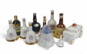 A collection of Wade Bell's Whiskey decanters to include Stage Coach decanter to commemorate Royal