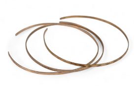 Three 9ct gold bangles, 9.3g.