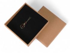 9ct gold pendant and chain, set with two brown stones, 1.2g.