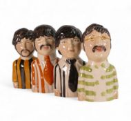 Four Peggy Davis The Beatles ceramic statues, compromising John, Paul, George and Ringo, artists