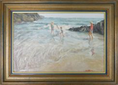 Framed textured oil painting depicting Children playing and paddling in the sea. measures 42cm