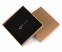 9ct gold heart shaped pendant set with brown stone and 9ct gold chain, 1.1g.