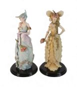 The Leonardo Collection Enchanted Garden figurines, Celeste Fairy together with Daphne, on wooden