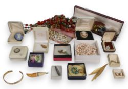 A collection of costume jewellery including Wedgwood jasperware brooches, Silver, beads and more,