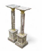 A pair of Italian solid marble columns with brass decoration. COURIER/COLLECTION ONLY. (H: 103cm)