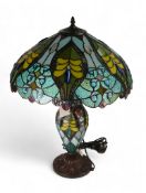 A Tiffany style table lamp by Minister Stylish Living, baluster shaped body with twin bulb fitting
