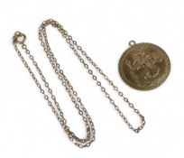9ct gold round St Christopher's medallion with 9ct gold necklace, 5.4g.