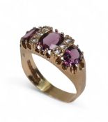 9ct gold ring, set with three amethyst stones surrounded by white stones, size S,4.1g.
