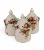 Royal Albert 'Old Country Roses' set of three lidded storage jars. Height:- 20cm including lids (3)