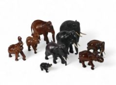 A selection of wooden elephants mixed sizes and different types of wood (1tray)