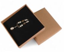 9ct gold pearl set pendant and chain, 4.1g.