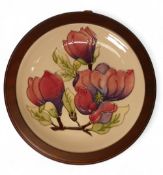 Moorcroft Plate 783/10, 'Magnolia' design on cream ground measures 30cm including surround with