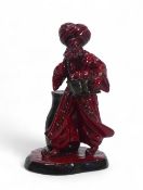Royal Doulton Flambe The Lamp Seller HN3278, tallest 23cm