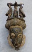 Vintage African carved wood mask in the style of Baule or Yohure peoples height 62cm