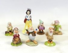 Royal Doulton Disney Showcase Character figures to include:- Snow White SW9, Grumpy SW11, Dopey by