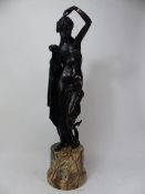 French bronze sculpture of a semi-nude lady wearing draping garments, leaves and vines covering