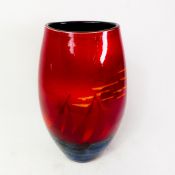 A Poole Pottery vase, vibrantly decorated with boats on the water under a sunset, height 28cm.