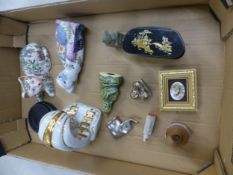 A collection of Oriental items to include Chinese cat figurines, white and gold ceramic Egyptian