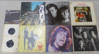 Mixed vinyl LPs and singles, to include The Beatles Abbey Road, Fleetwood Mac Rumours, The Rolling