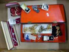 Mixed vintage costume jewellery in a vintage black lacquered slim jewellery box, including