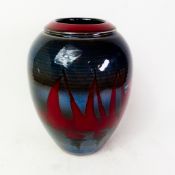 Poole Pottery vase decorated with boats in silhouette, height 24cm.