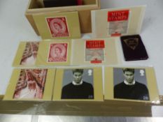 A wooden box of unused Royal Mail 'Mint' stamps