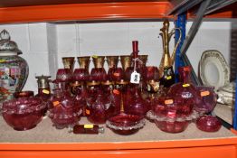 A LARGE QUANTITY OF CRANBERRY GLASSWARE, to include, cranberry and gilt bohemian decanter, six