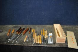 A TRAY CONTAINING TWENTY ONE WOOD TURNING CHISELS by Henry Taylor, Marples, Sorby, etc. (stored in