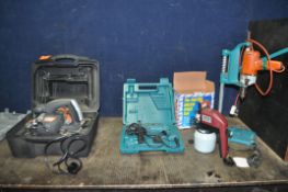 A COLLECTION OF POWER TOOLS including a Makita HP1501 drill, a Challenge Xtreme circular saw, a