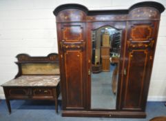 AN EDWARDIAN MAHOGANY, MARQUETRY INLAID AND BOX STUNG BEDROOM SUITE, comprising a triple door