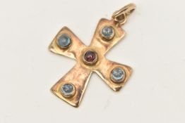 A YELLOW METAL GEM SET CROSS PENDANT, polished cross set with a central garnet cabochon and four