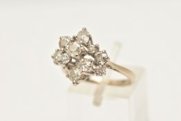 AN 18CT WHITE GOLD DIAMOND CLUSTER RING, asymmetrical cluster of various sized old cut diamonds,